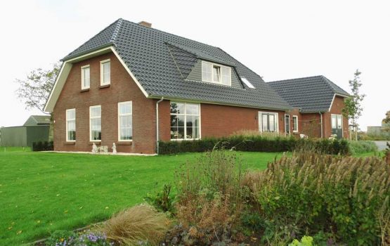 bouwen van landelijke woning met wolfskap / wolfseinden