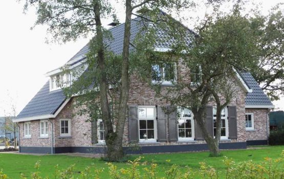 bouwen van landelijke woning met wolfskap / wolfseinden