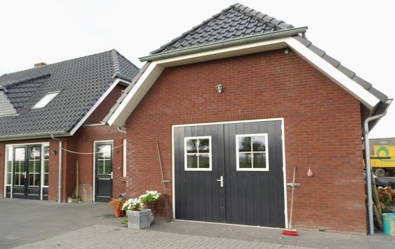 bouwen van landelijke woning met wolfskap / wolfseinden