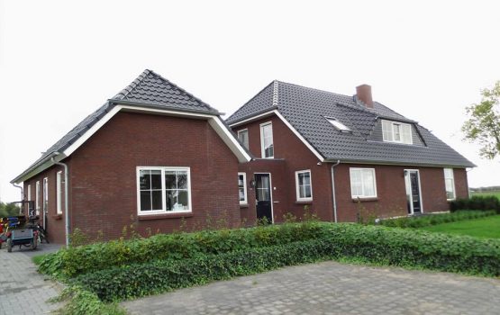 bouwen van landelijke woning met wolfskap / wolfseinden