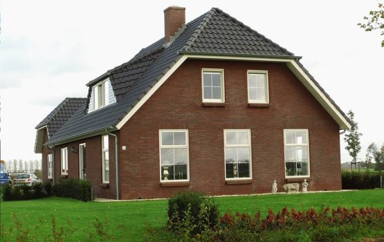 bouwen van landelijke woning met wolfskap / wolfseinden