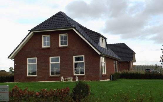 bouwen van landelijke woning met wolfskap / wolfseinden