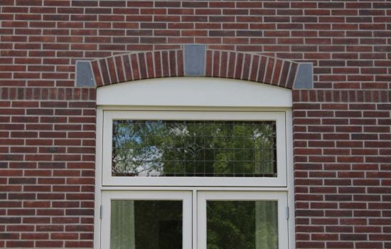 Getoogde kozijnen met glas in lood ramen bij Herenhuis in Ermelo, gebouwd door aannemersbedrijf Wielink